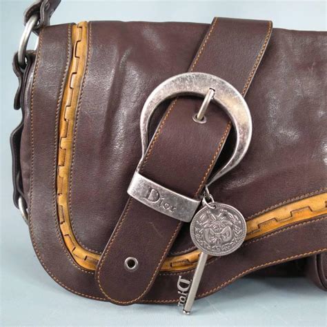 dior brown leather belt buckle key charm saddle shoulder bag|Dior Gaucho Saddle Bag .